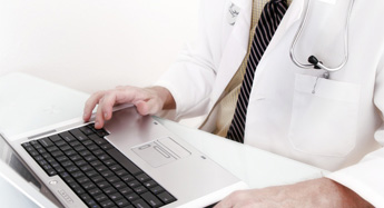 Dr using laptop